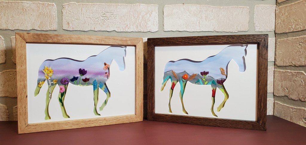 Horse standing side view silhouette with pastel sky background and embroidered flower details.