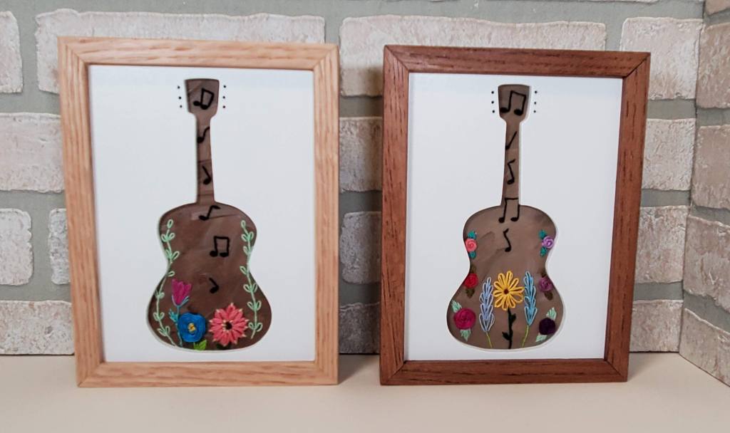 Examples of guitar silhouette with brown backgrounds, embroidered flower and music note details